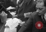 Image of Newspaper headlines tell of Allied invasion New York City USA, 1944, second 16 stock footage video 65675051457