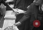 Image of Newspaper headlines tell of Allied invasion New York City USA, 1944, second 21 stock footage video 65675051457