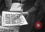 Image of Newspaper headlines tell of Allied invasion New York City USA, 1944, second 24 stock footage video 65675051457