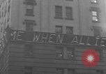 Image of Newspaper headlines tell of Allied invasion New York City USA, 1944, second 54 stock footage video 65675051457
