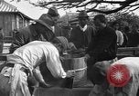 Image of Okinawan civilians Okinawa Ryukyu Islands, 1945, second 33 stock footage video 65675051469
