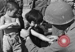 Image of Okinawan civilians Okinawa Ryukyu Islands, 1945, second 31 stock footage video 65675051472