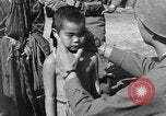 Image of Okinawan civilians Okinawa Ryukyu Islands, 1945, second 50 stock footage video 65675051472