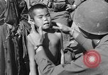 Image of Okinawan civilians Okinawa Ryukyu Islands, 1945, second 59 stock footage video 65675051472