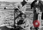 Image of Okinawan civilians Okinawa Ryukyu Islands, 1945, second 10 stock footage video 65675051473