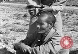Image of Okinawan civilians Okinawa Ryukyu Islands, 1945, second 32 stock footage video 65675051473