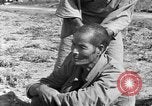 Image of Okinawan civilians Okinawa Ryukyu Islands, 1945, second 33 stock footage video 65675051473