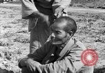 Image of Okinawan civilians Okinawa Ryukyu Islands, 1945, second 37 stock footage video 65675051473