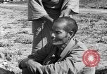 Image of Okinawan civilians Okinawa Ryukyu Islands, 1945, second 38 stock footage video 65675051473