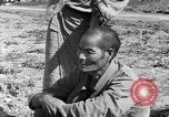 Image of Okinawan civilians Okinawa Ryukyu Islands, 1945, second 44 stock footage video 65675051473