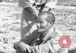 Image of Okinawan civilians Okinawa Ryukyu Islands, 1945, second 49 stock footage video 65675051473