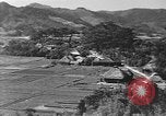 Standbild Local Village Okinawa Ryukyu Inseln, 1945, aus Sekunde 12 historischem Filmmaterial Videoclip 65675051475