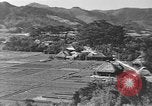 Standbild Local Village Okinawa Ryukyu Inseln, 1945, aus Sekunde 16 historischem Filmmaterial Videoclip 65675051475