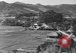 Standbild Local Village Okinawa Ryukyu Inseln, 1945, aus Sekunde 22 historischem Filmmaterial Videoclip 65675051475