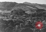 Standbild Local Village Okinawa Ryukyu Inseln, 1945, aus Sekunde 39 historischem Filmmaterial Videoclip 65675051475