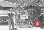 Image of Local men work Okinawa Ryukyu Islands, 1945, second 5 stock footage video 65675051476
