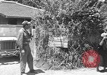 Image of Local men work Okinawa Ryukyu Islands, 1945, second 9 stock footage video 65675051476