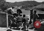 Image of Local men work Okinawa Ryukyu Islands, 1945, second 51 stock footage video 65675051476