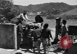 Image of Local men work Okinawa Ryukyu Islands, 1945, second 53 stock footage video 65675051476