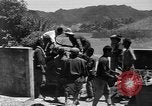 Image of Local men work Okinawa Ryukyu Islands, 1945, second 54 stock footage video 65675051476