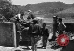 Image of Local men work Okinawa Ryukyu Islands, 1945, second 56 stock footage video 65675051476