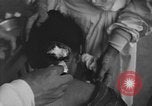 Image of Okinawa civilian wounded receive treatment  Okinawa Ryukyu Islands, 1945, second 8 stock footage video 65675051481