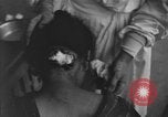 Image of Okinawa civilian wounded receive treatment  Okinawa Ryukyu Islands, 1945, second 10 stock footage video 65675051481