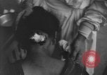 Image of Okinawa civilian wounded receive treatment  Okinawa Ryukyu Islands, 1945, second 11 stock footage video 65675051481