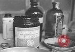 Image of Okinawa civilian wounded receive treatment  Okinawa Ryukyu Islands, 1945, second 19 stock footage video 65675051481