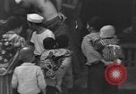 Image of Okinawa civilian wounded receive treatment  Okinawa Ryukyu Islands, 1945, second 23 stock footage video 65675051481