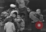 Image of Okinawa civilian wounded receive treatment  Okinawa Ryukyu Islands, 1945, second 27 stock footage video 65675051481
