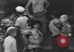 Image of Okinawa civilian wounded receive treatment  Okinawa Ryukyu Islands, 1945, second 28 stock footage video 65675051481