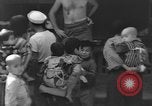Image of Okinawa civilian wounded receive treatment  Okinawa Ryukyu Islands, 1945, second 30 stock footage video 65675051481