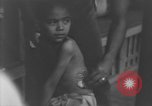 Image of Okinawa civilian wounded receive treatment  Okinawa Ryukyu Islands, 1945, second 31 stock footage video 65675051481