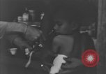 Image of Okinawa civilian wounded receive treatment  Okinawa Ryukyu Islands, 1945, second 56 stock footage video 65675051481