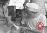 Image of Okinawa civilian wounded receive treatment  Okinawa Ryukyu Islands, 1945, second 59 stock footage video 65675051481