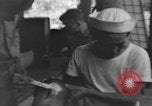 Image of Okinawa civilian wounded receive treatment  Okinawa Ryukyu Islands, 1945, second 61 stock footage video 65675051481
