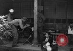 Image of Civilians in Okinawa field hospital Okinawa Ryukyu Islands, 1945, second 4 stock footage video 65675051482