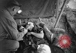 Image of Civilians in Okinawa field hospital Okinawa Ryukyu Islands, 1945, second 62 stock footage video 65675051482