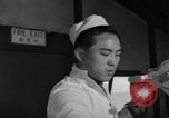 Image of Korean man Korea, 1957, second 52 stock footage video 65675051528
