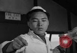 Image of Korean man Korea, 1957, second 54 stock footage video 65675051528