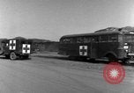 Image of United States soldiers evacuating wounded Korea, 1954, second 13 stock footage video 65675051535