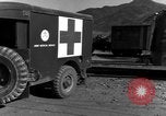 Image of United States soldiers evacuating wounded Korea, 1954, second 27 stock footage video 65675051535