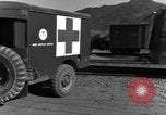 Image of United States soldiers evacuating wounded Korea, 1954, second 28 stock footage video 65675051535