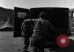 Image of United States soldiers evacuating wounded Korea, 1954, second 29 stock footage video 65675051535