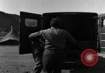 Image of United States soldiers evacuating wounded Korea, 1954, second 30 stock footage video 65675051535