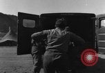 Image of United States soldiers evacuating wounded Korea, 1954, second 33 stock footage video 65675051535