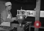 Standbild Vorbereitung der Teig Muttern Uijongbu Südkorea, 1954, aus Sekunde 57 historischem Filmmaterial Videoclip 65675051544