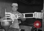 Standbild Vorbereitung der Teig Muttern Uijongbu Südkorea, 1954, aus Sekunde 59 historischem Filmmaterial Videoclip 65675051544