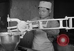 Standbild Vorbereitung der Teig Muttern Uijongbu Südkorea, 1954, aus Sekunde 61 historischem Filmmaterial Videoclip 65675051544